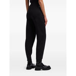 EMPORIO ARMANI CAPSULE Trousers Black with elastic waistband, ribbed ankles, side pockets, cotton material; back view.