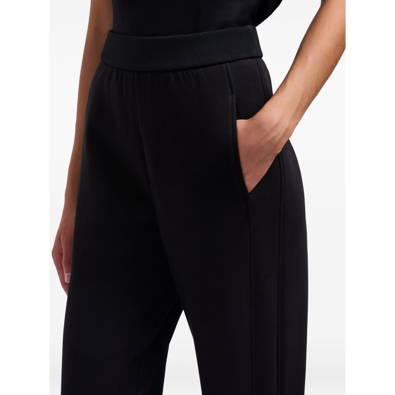 EMPORIO ARMANI CAPSULE Trousers Black with elastic waistband, ribbed ankles, and side pockets.