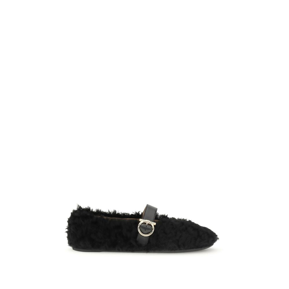 Ferragamo Black Fur Ballet Flats with Gancini buckle and curly shearling lining for AW25.