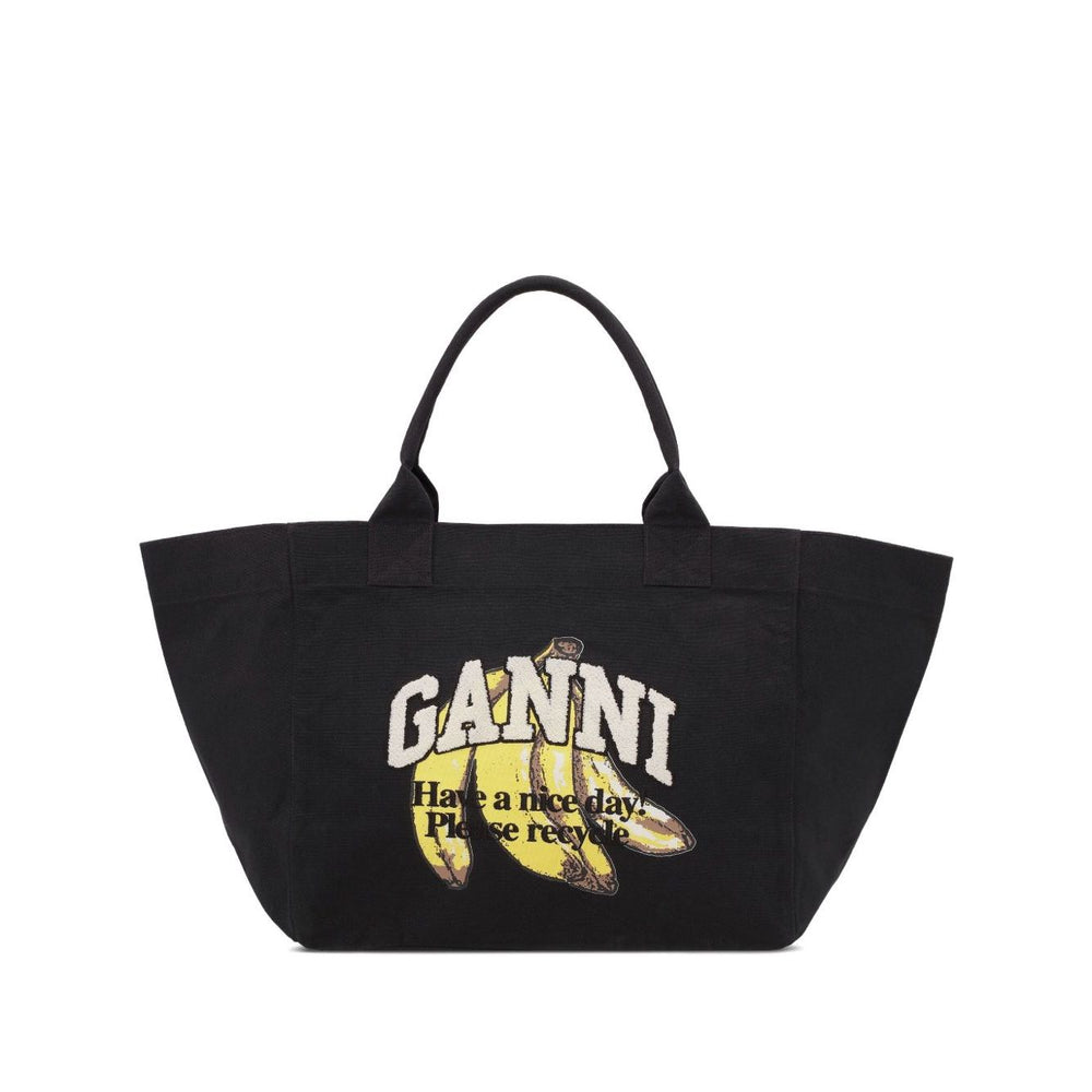 Ganni Organic cotton XXL tote bag with black graphic banana print and logo on front, featuring two top handles.