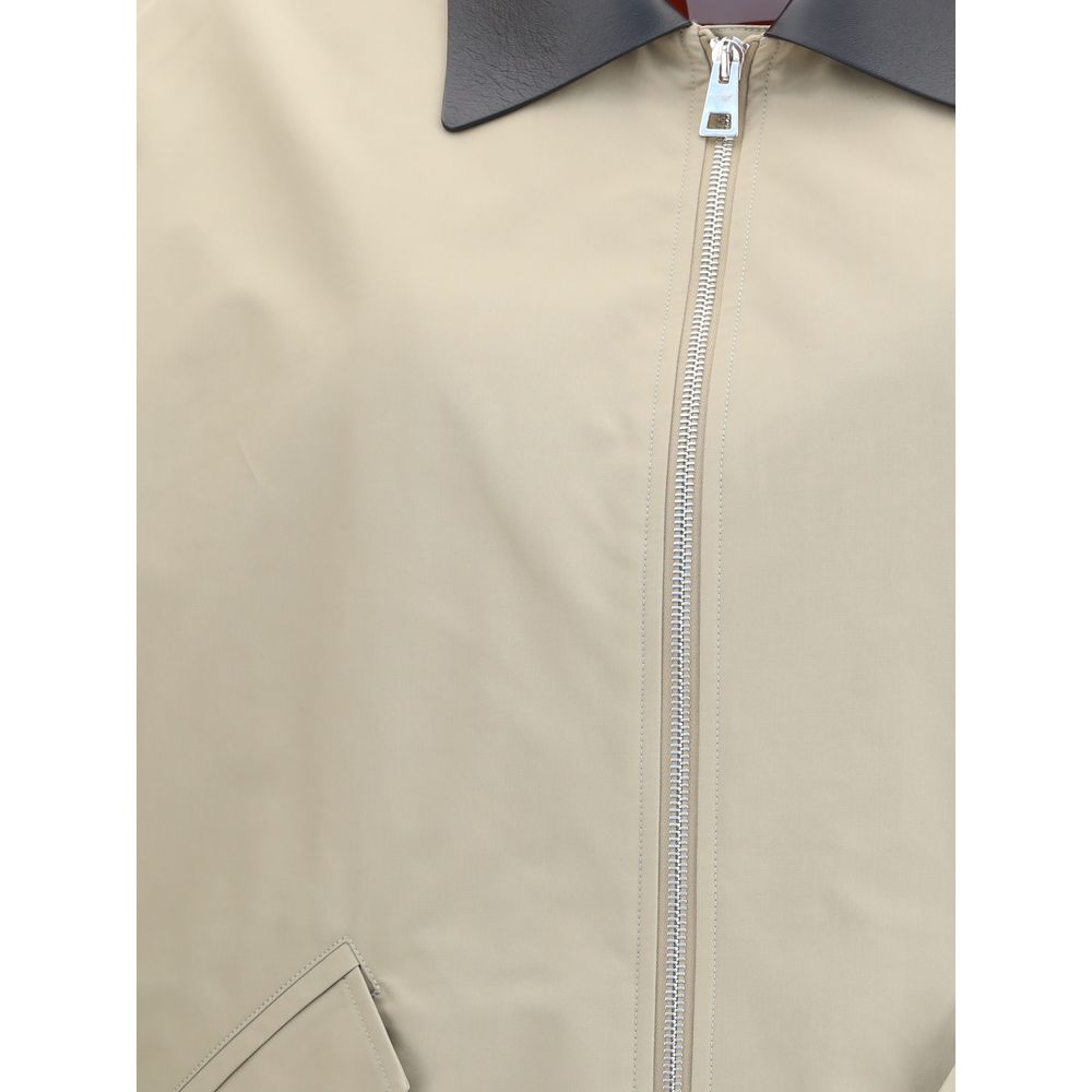 Close-up of Givenchy Beige Cotton Jackets And Coat showcasing zipper and leather collar detail.