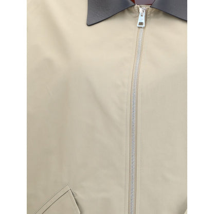 Close-up of Givenchy Beige Cotton Jackets And Coat showcasing zipper and leather collar detail.