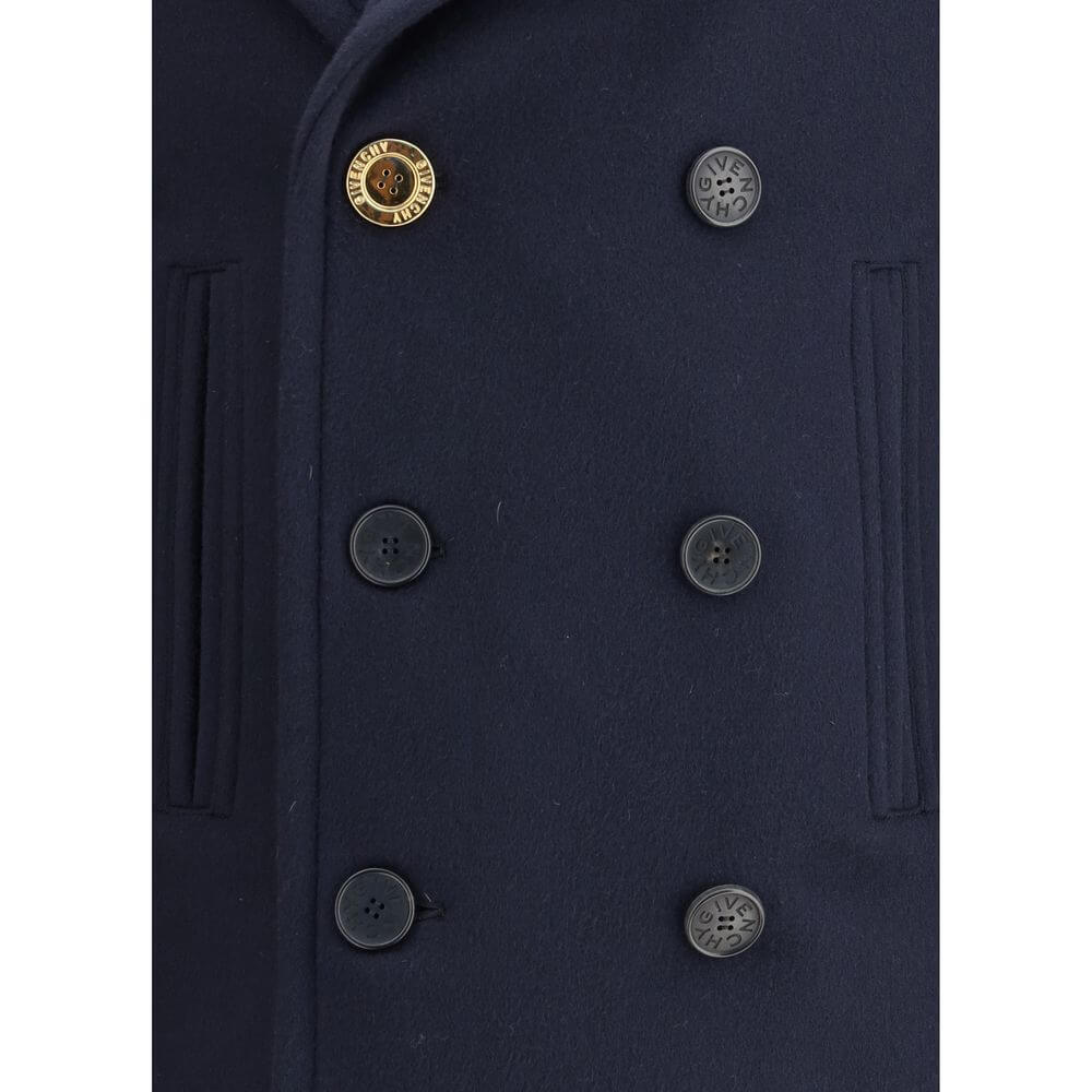 Givenchy Blue Wool Coat close-up showing double-breasted button design and front welt pockets for AW25 collection.