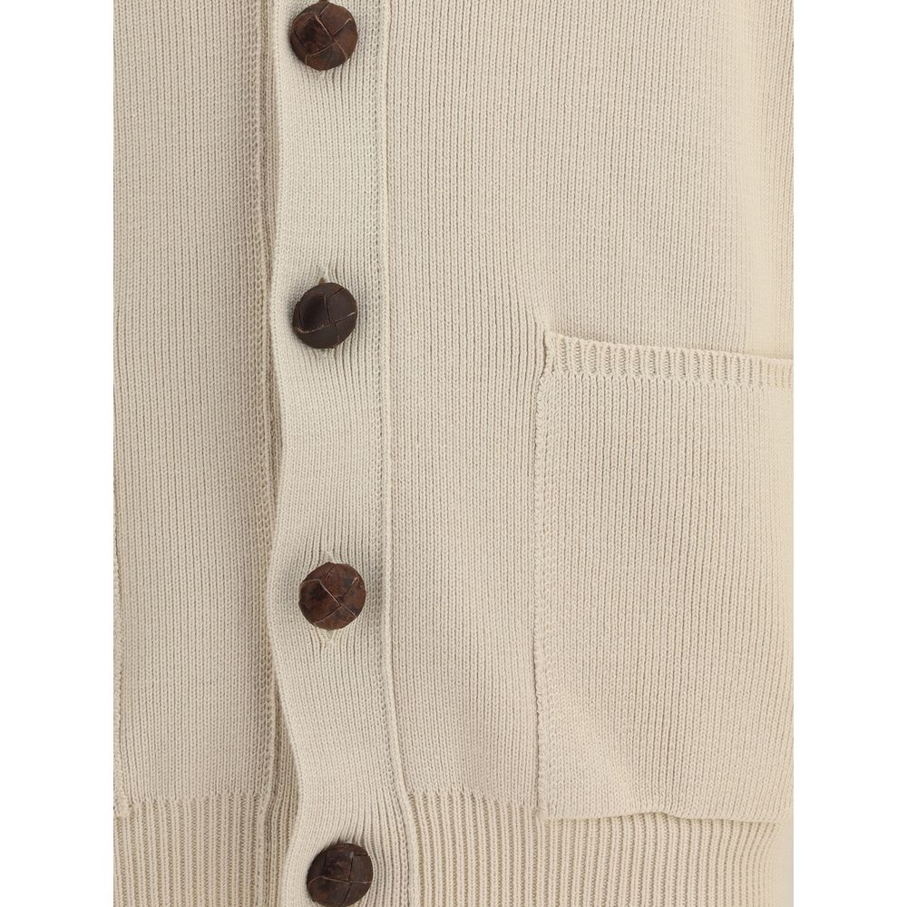 Close-up of Golden Goose Cream Cotton Cardigan showing button details and patch pocket, featuring sustainable materials and regular fit.