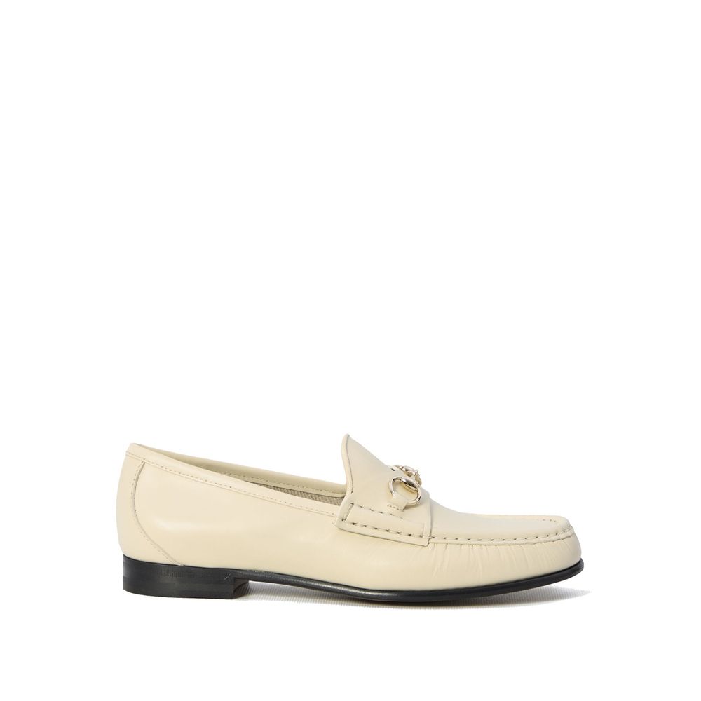 Gucci Bicolor Leather Slip-On Loafers with gold-tone horsebit, women's round toe design, made in Italy, luxury footwear.