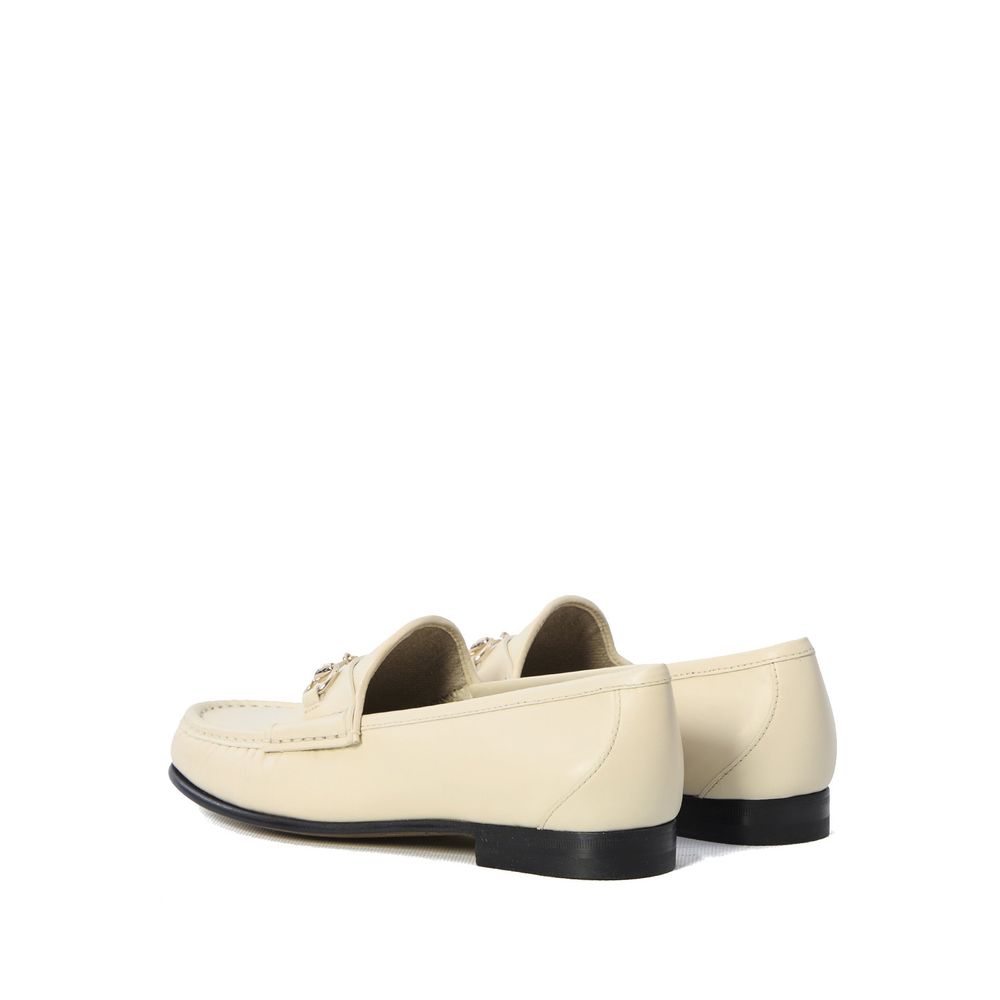 Gucci Bicolor Leather Slip-On Loafers, women's shoes, 100% leather, gold-tone horsebit hardware, made in Italy, rear view.