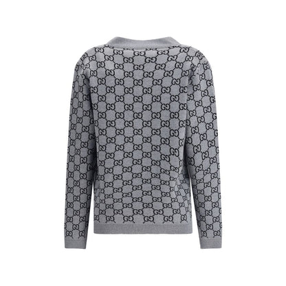 Gucci Black Wool Cardigan with GG Supreme pattern and ribbed trim, features a reversible design for smart or casual looks.