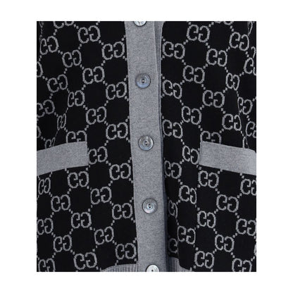 Gucci Black Wool Cardigan with GG Supreme pattern, V-neck, button closure, and front pockets in black and white tubular jacquard wool.