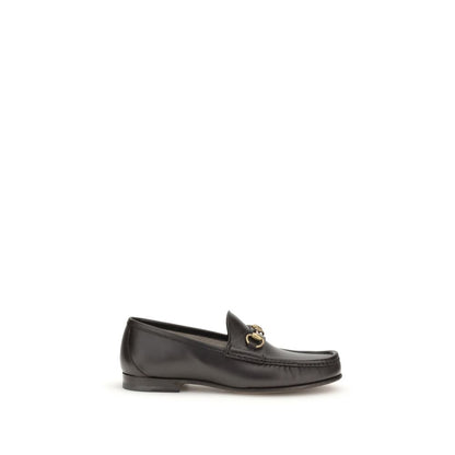 Gucci Brown Calf Leather Bos Taurus Slip-On Loafers with Horsebit detail and gold-tone hardware, part of 1953 Collection.