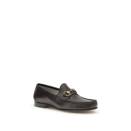 Gucci Brown Calf Leather Bos Taurus Slip-On Loafers with Horsebit detail and gold-tone hardware, part of the 1953 Collection.