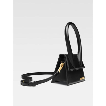 Jacquemus Le Chiquito Moyen Black Bag with gold hardware, magnetic flap closure, removable strap, and logo. Made in Italy.