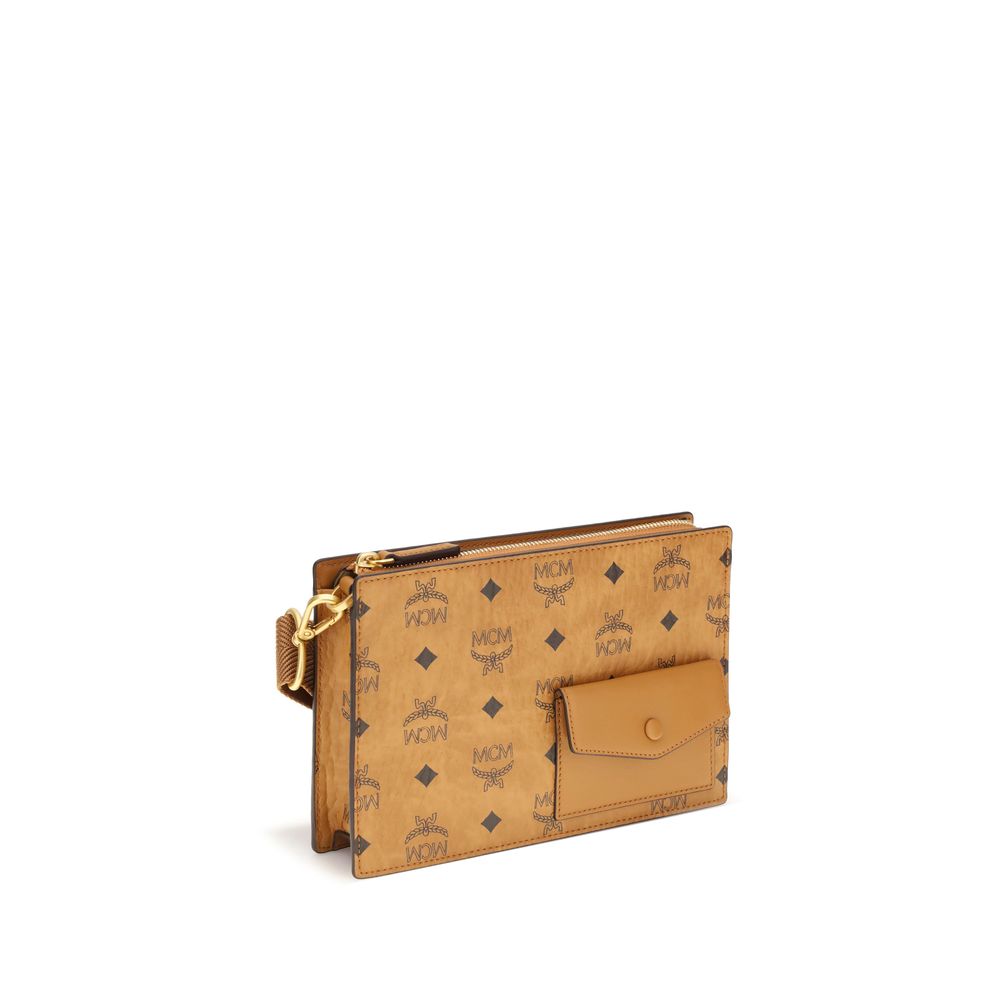 MCM Brown Canvas Shoulder Bag with Visetos print, featuring a front flap pocket, adjustable strap, and zippered closure for stylish everyday use.