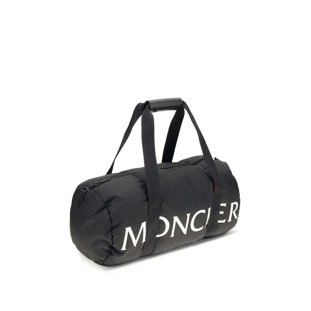Moncler Black Nylon Luggage And Travel duffle bag with leather-tab handles and shoulder strap.