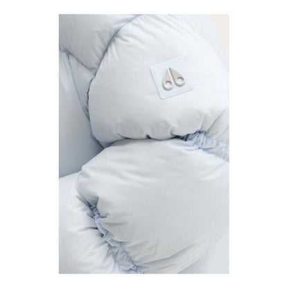 Moose Knuckles Light Blue Nylon Women Jacket close-up showing fabric detail and logo.