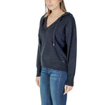 Woman wearing Morgan De Toi Blue Viscose Sportswear sweatshirt, part of the Spring/Summer collection, in a casual pose.