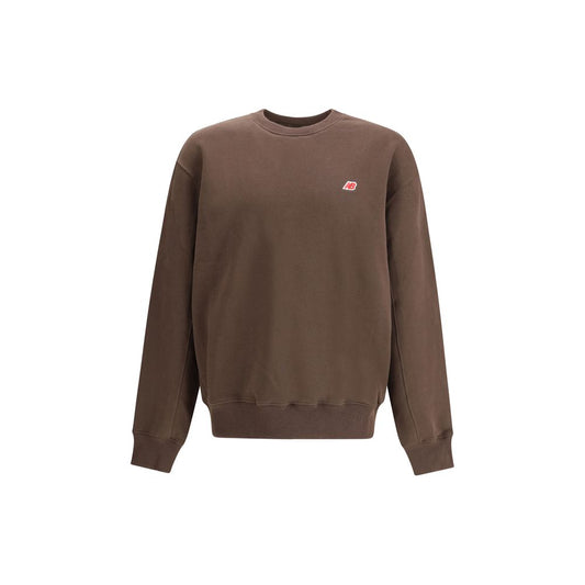 New Balance Brown Cotton Sweatshirt with crew neckline, relaxed fit, and ribbed cuffs, ideal for casual wear in AW25 season.