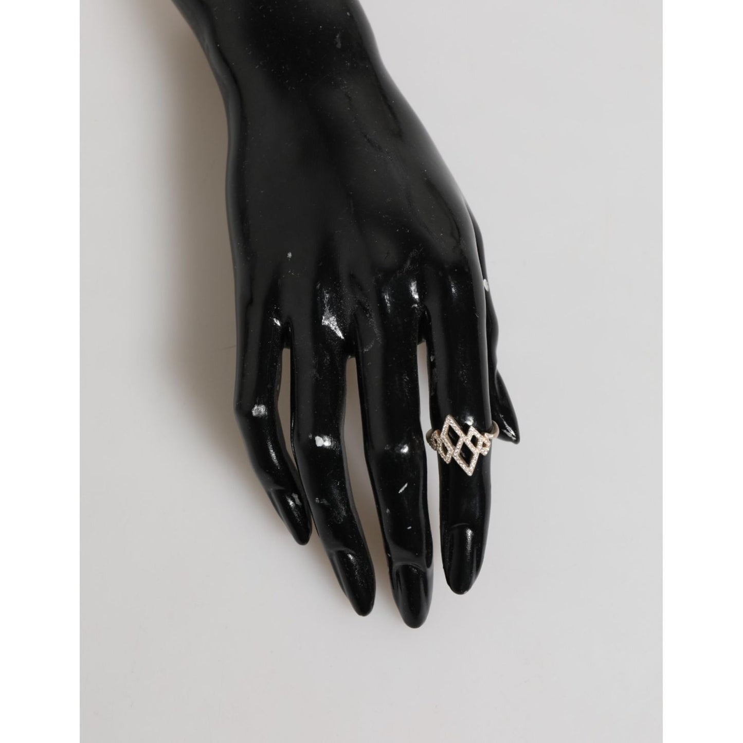 Nialaya Geometric Diamond Shape Pave CZ Crystal Jewelry Ring on mannequin hand, showcasing gold color and sparkling cubic zirconia crystals.