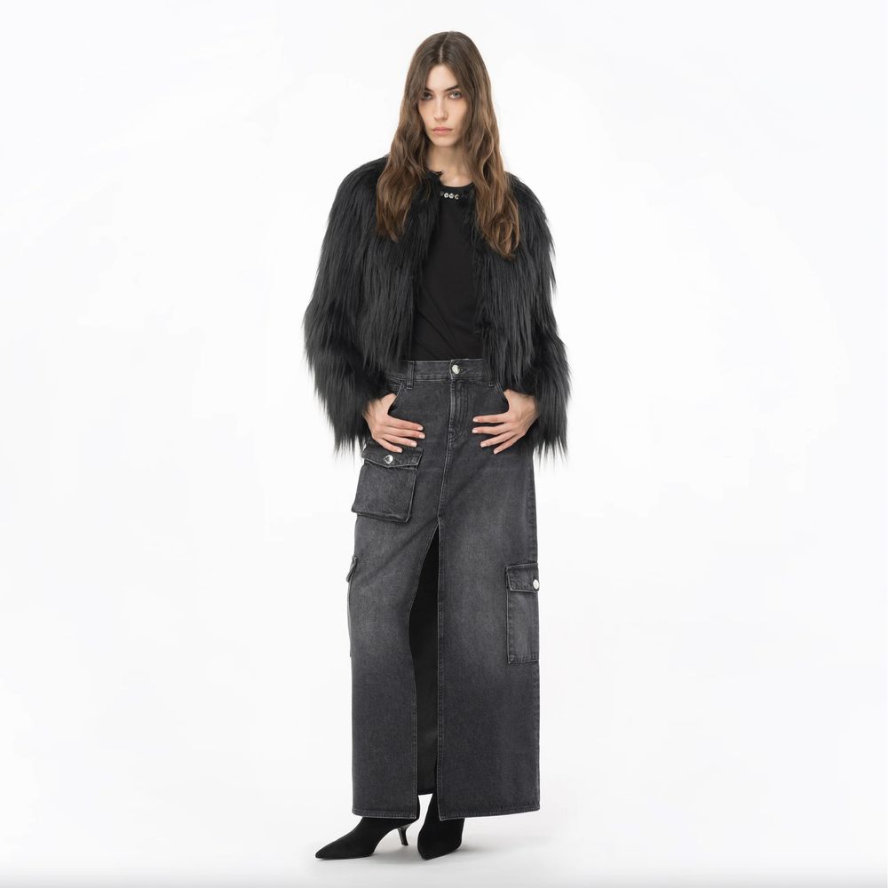 Model wearing PINKO Black Cotton Skirt with zip closure, showcasing long design, back and side flap pockets for stylish look.