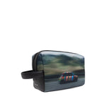 Paul Smith Recycled Polyester 'Pixelated Mini' Washbag with vibrant car graphic, leather top handle, and spacious interior.