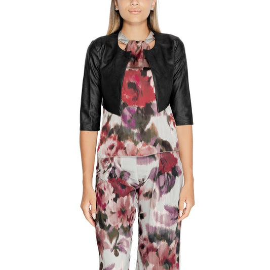 Woman wearing Rinascimento Black Polyethylene Cardigan with floral outfit, showcasing elegant modern style, bolero design.