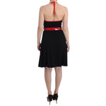 Roccobarocco Black belted palladio dress with red belt, knee length and sleeveless, back view.
