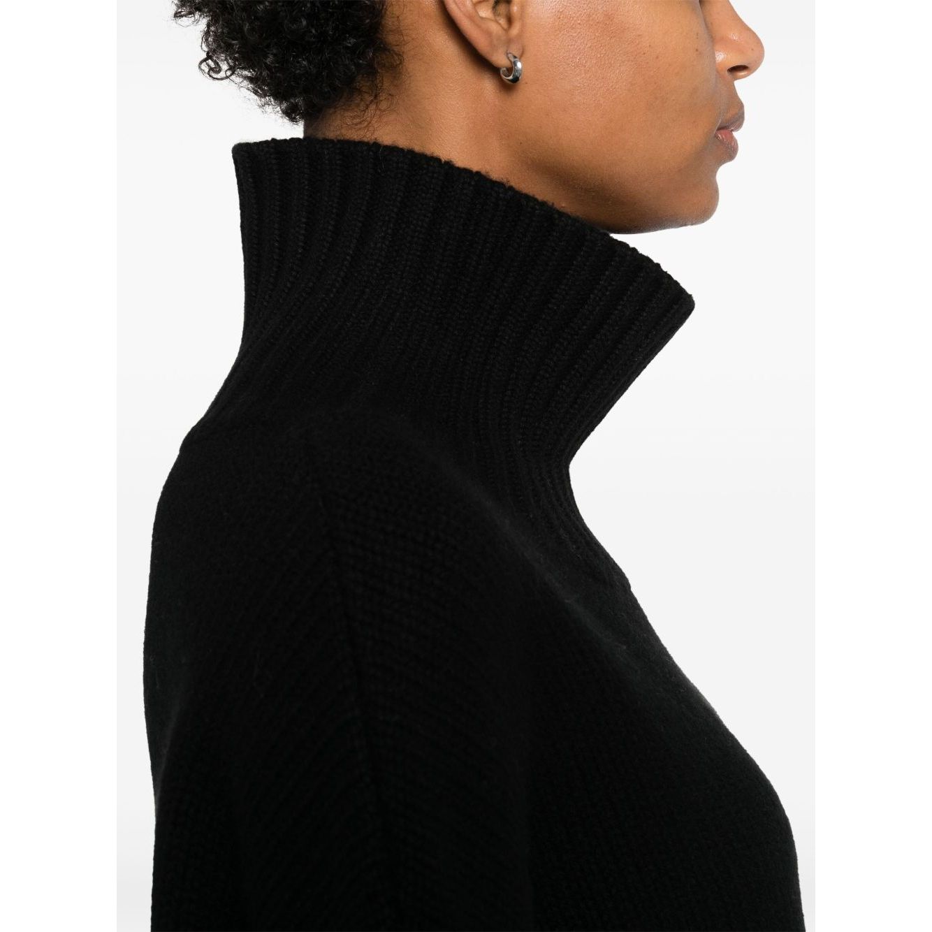 Side view of SOFT GOAT Sweaters Black cashmere turtle-neck jumper with ribbed high neck and long sleeves.