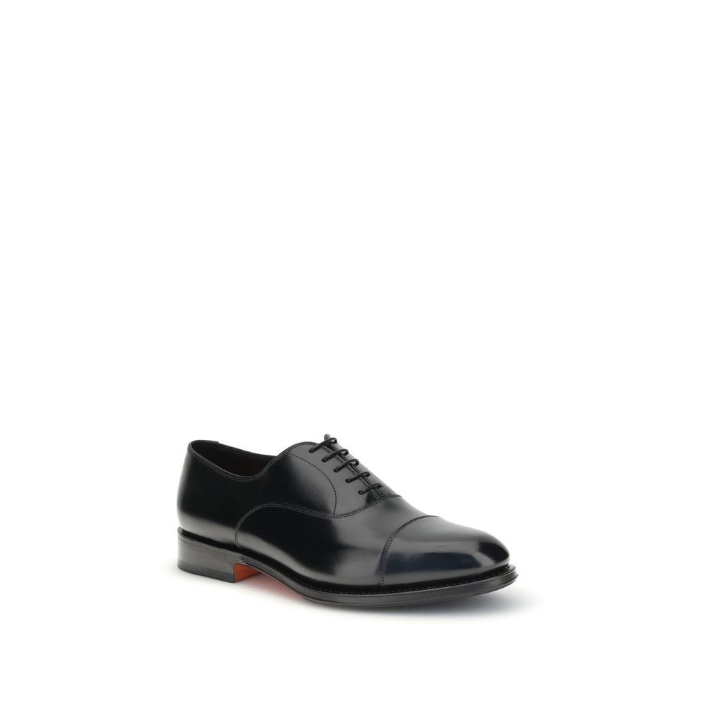 Santoni Black Calf Leather Bos Taurus Oxfords And Derbies showcasing elegant hand-antiqued design with a classic silhouette and Goodyear construction.