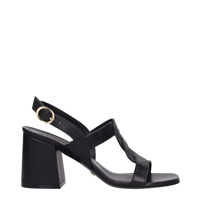 Stuart Weitzman Black Leather Platform Sandals with buckle closure, open toe, and mid heels, style F80709.