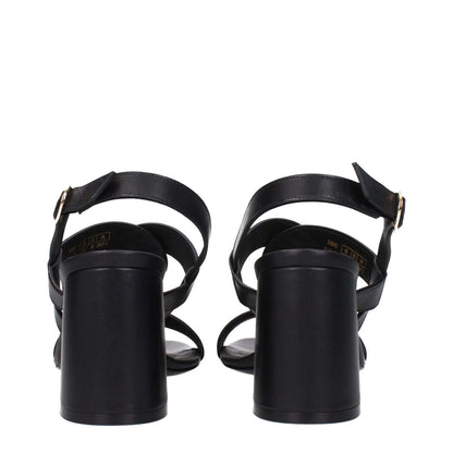 Stuart Weitzman Black Leather Platform Sandals with buckle closure and mid heels, rear view showcasing open toe design, heel height 7.5 cm.