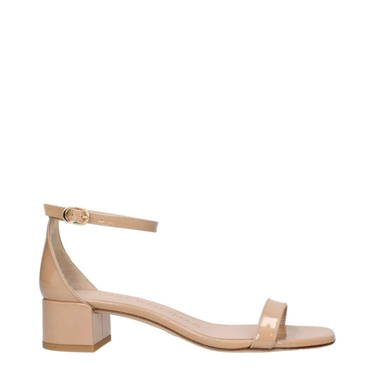 Stuart Weitzman Pink Leather Sandals with open toe and buckle closure, featuring mid heels and leather sole. MPN NUDISTCURVE35PATSA536ADOBE.