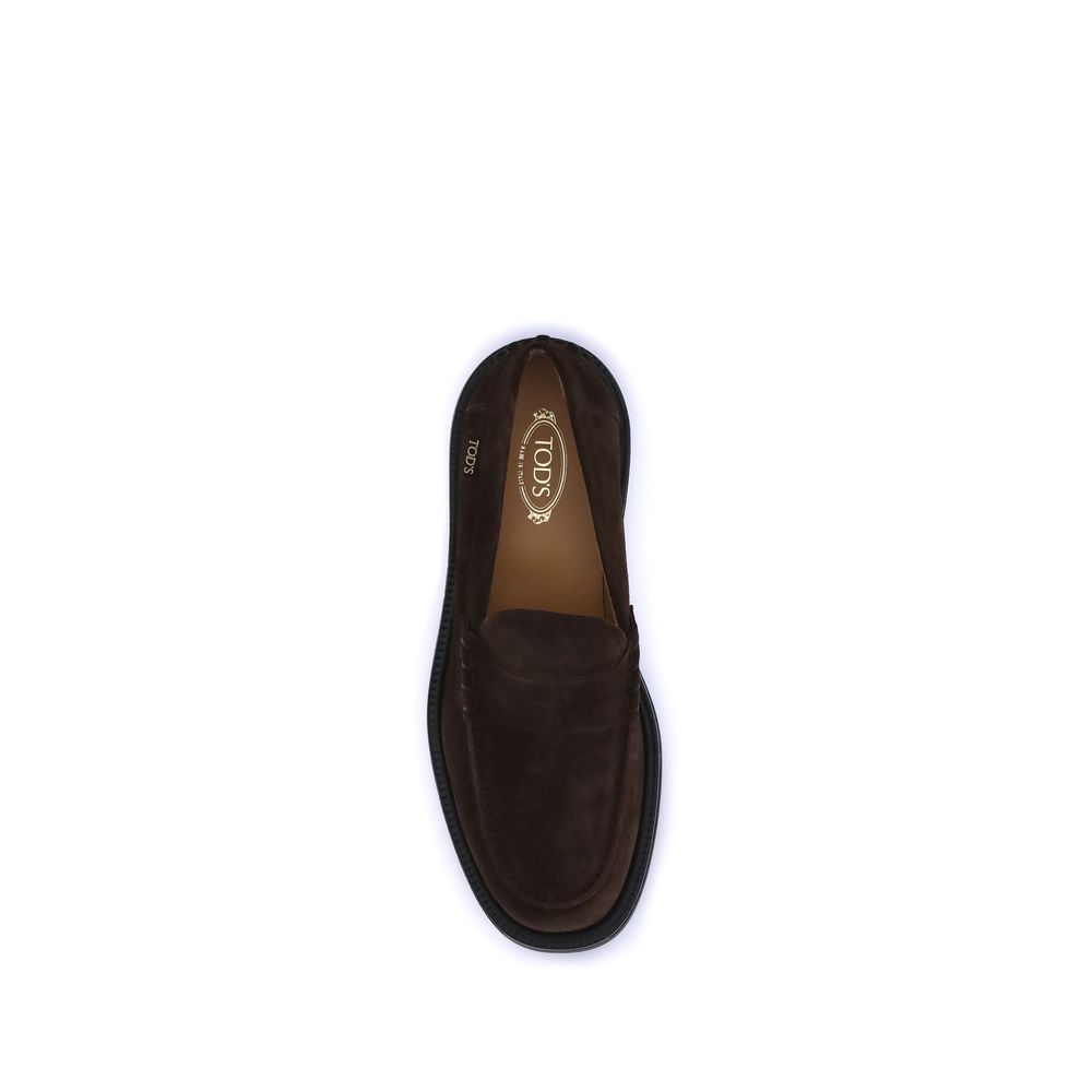 Top view of Tod's Brown Rubber Slip-On Loafers with suede and hand-stitched vamp, showcasing luxury and craftsmanship.