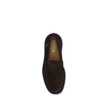 Top view of Tod's Brown Rubber Slip-On Loafers with suede and hand-stitched vamp, showcasing luxury and craftsmanship.