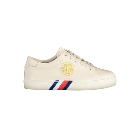 Tommy Hilfiger Beige Leather Women Sneaker with iconic logo, contrasting details, crafted for style and comfort in urban settings.