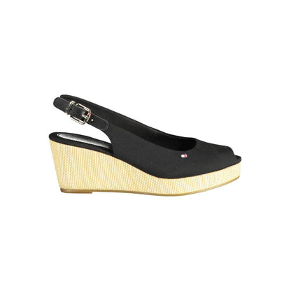 Tommy Hilfiger Black Leather Women Sandal with ankle buckle and 7 cm heel, perfect for chic daytime or nighttime elegance.