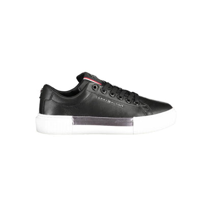 Tommy Hilfiger Black Leather Women Sneaker with white sole and logo detailing, showcasing sporty chic style.