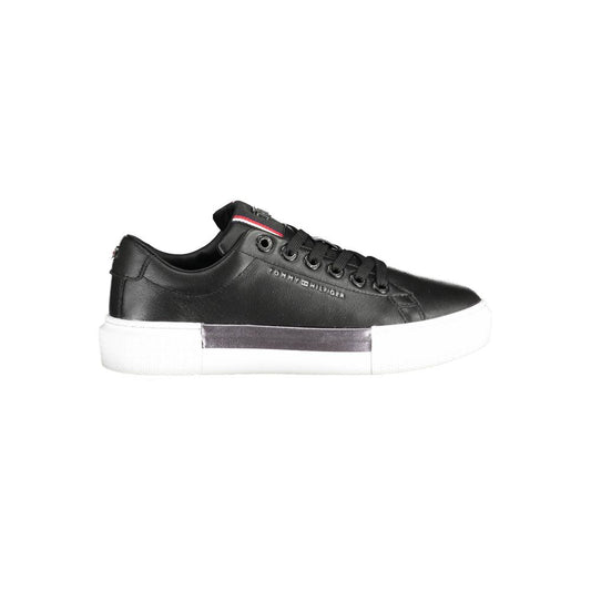 Tommy Hilfiger Black Leather Women Sneaker with white sole and logo detailing, showcasing sporty chic style.