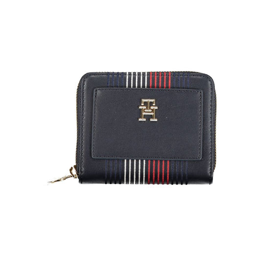 Tommy Hilfiger Blue Polyethylene Wallet with zip closure, logo, and contrasting details featuring external pocket and card compartments.