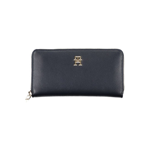 Tommy Hilfiger Elegant Blue Designer Wallet with zip closure and logo in stylish design.