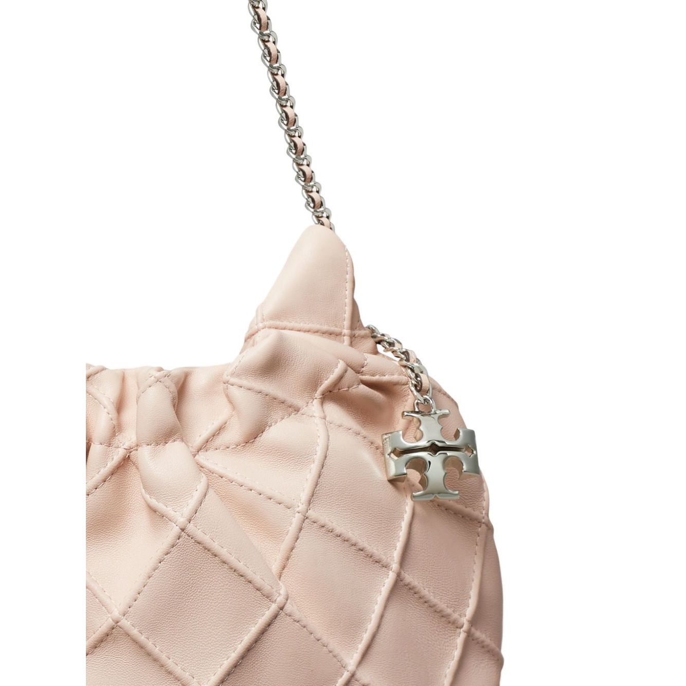 Pale pink Tory Burch Fleming mini leather hobo bag with quilted design, chain-link shoulder strap, and detachable charm.