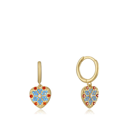Colorful heart-shaped earrings with a geometric pattern on gold hoops.