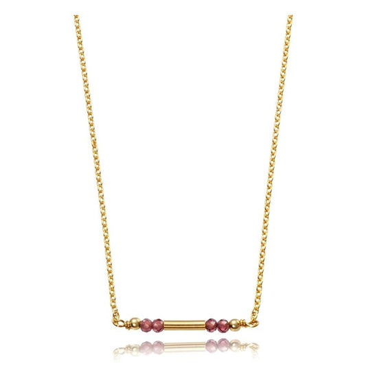 Gold necklace with small pink beads, featuring a minimalist design.
