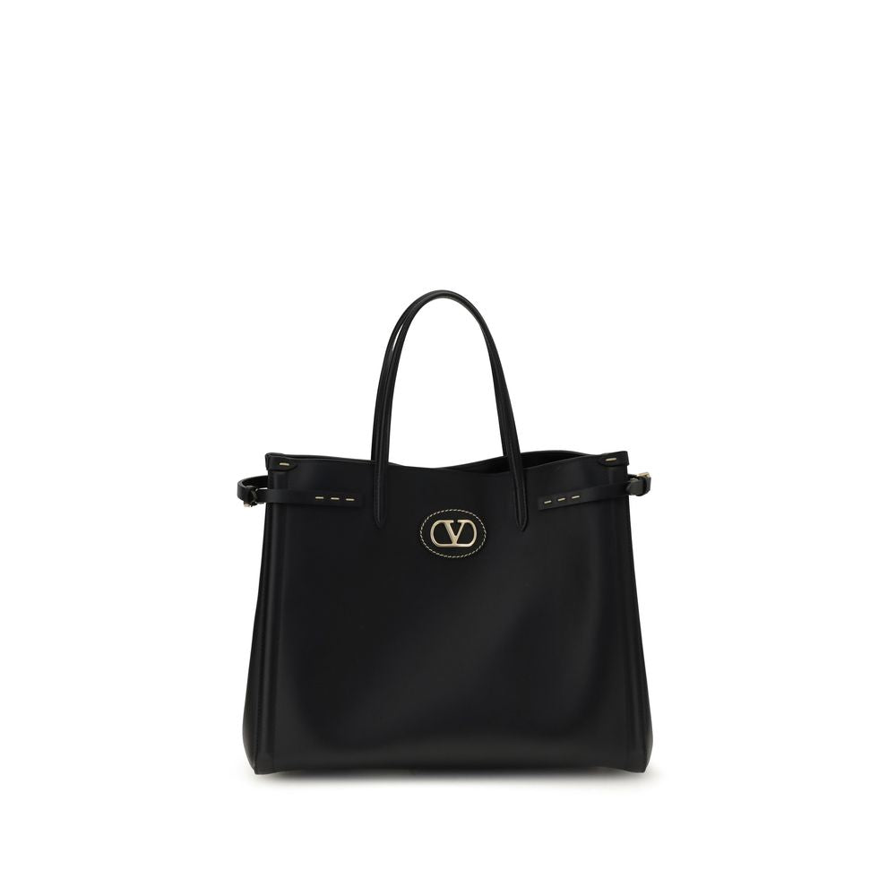 Valentino Garavani Black Calf Leather Bos Taurus Handbag with metallic logo and side buckles, front view.