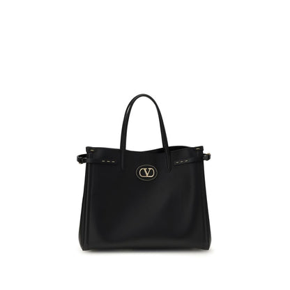 Valentino Garavani Black Calf Leather Bos Taurus Handbag with metallic logo and side buckles, front view.