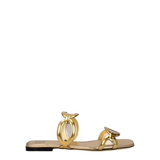 Valentino Garavani Gold Leather Slippers with open toe and low flat heel; casual style, perfect for adding elegance to any outfit.