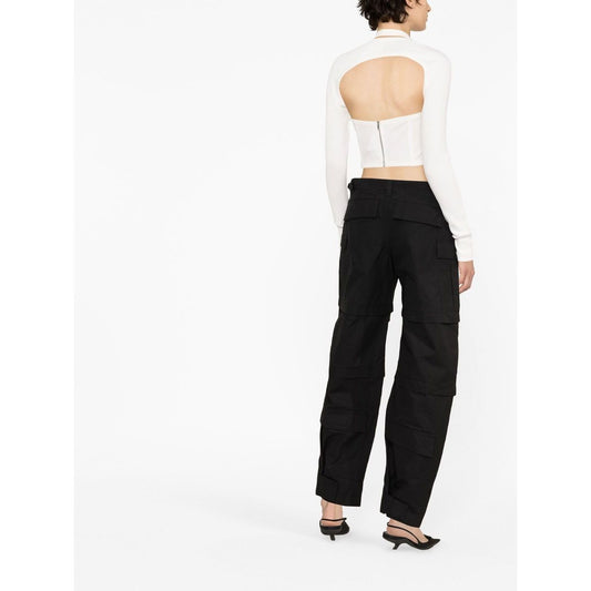Back view of model wearing WARDROBE.NYC WARDROBE NYC Trousers Black with detachable legs and cargo pockets.