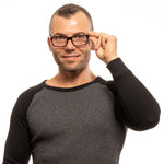 Man wearing Zadig & Voltaire Brown Men Glasses Frame with a full-rim rectangular style in brown plastic frame.
